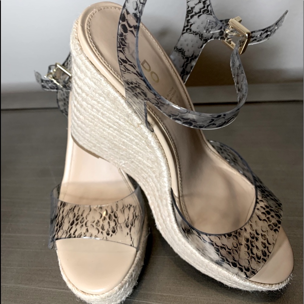 Wedge Espadrilles with clear straps.